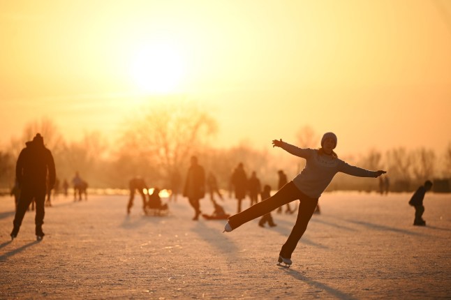 Mandatory Credit: Photo by Victoria Jones/Shutterstock (15095997au) Ice skaters skate on flooded Fenland fields at sunset in Upware, The Fens, Cambridgeshire Fen skaters in Cambridgeshire, UK - 11 Jan 2025