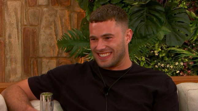 Curtis Pritchard smiling on Love Island All Stars.