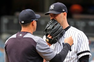 J.A. Happ has some words for Aaron Boone after he was pulled with one out in the sixth inning of the Yankees' 5-3 victory in Game 1 of a doubleheader on Wednesday.