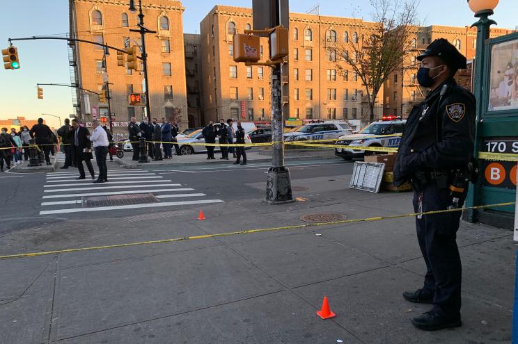 Police investigate the scene of a multiple shooting at E 170 St and Grand Concourse in The Bronx.