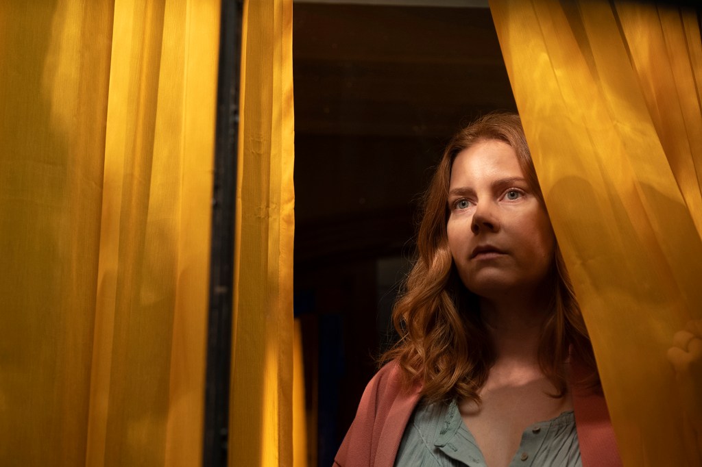 "The Woman in the Window" stars Amy Adams as an agoraphobic woman who lives alone in New York and begins spying on her new neighbors, only to witness a disturbing act of violence.