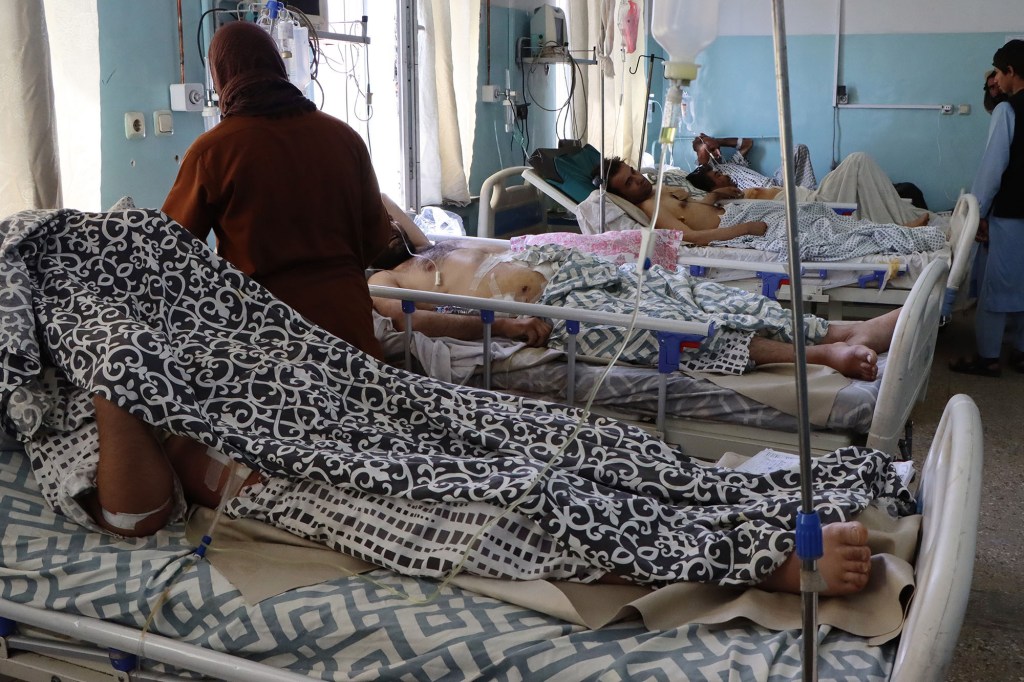 Injured victims of the airport bomb blast, receive treatment at a hospital in Kabul, Afghanistan on Aug. 27, 2021.