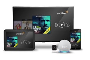 An array of devices like a TV, phone, tablet and more showing the Audible log in screen