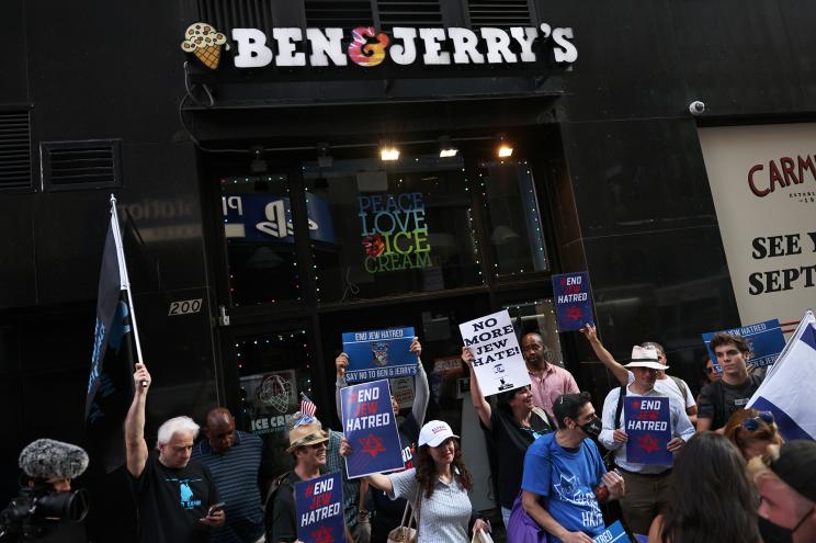 Protesters stand outside Ben & Jerry's Ice Cream at their Manhattan store on August 12, 2021.