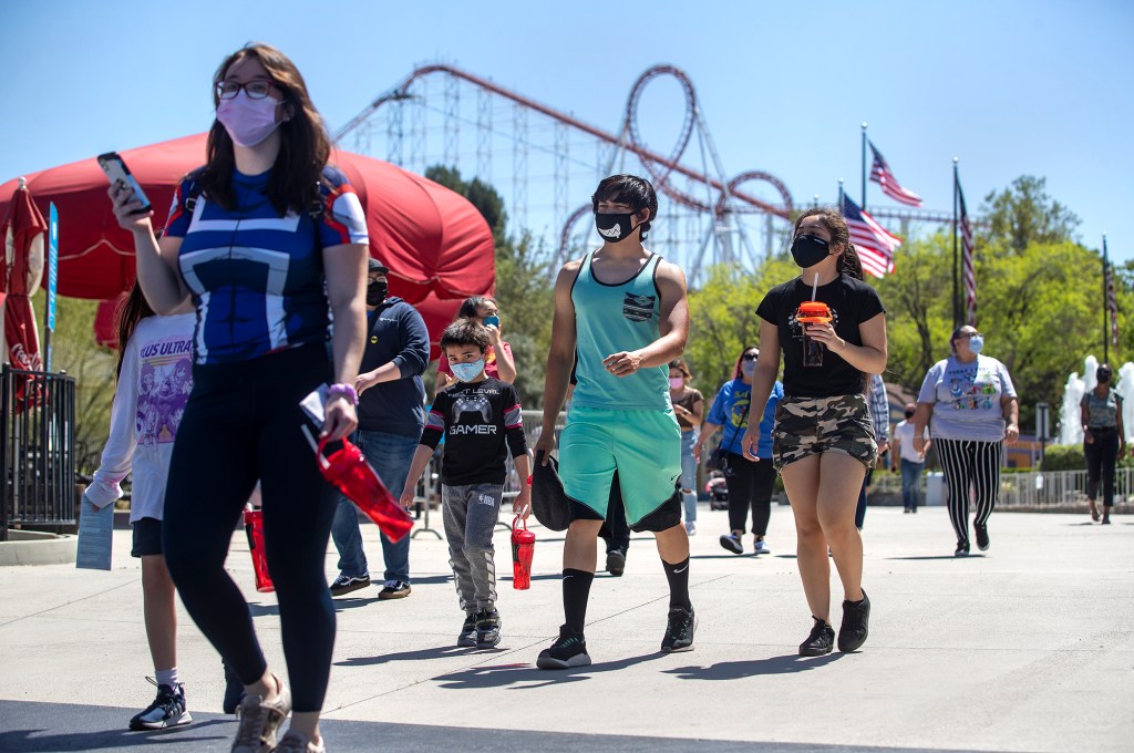 Attendees wearing masks in the park