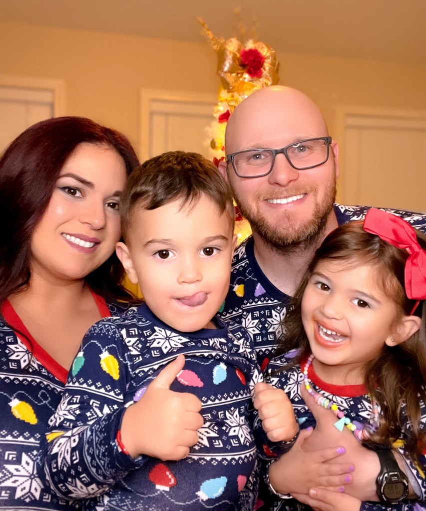 Damire Winn, now 36, with her husband David, 36, and their two children. The couple will celebrate 14 years of marriage on July 2.