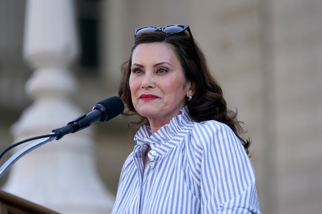 Gov. Gretchen Whitmer speaks to abortion-rights protesters at a rally following the United States Supreme Court's decision to overturn Roe v. Wade, federally protected right to abortion, outside the state capitol in Lansing, Mich., Friday, June 24, 2022.