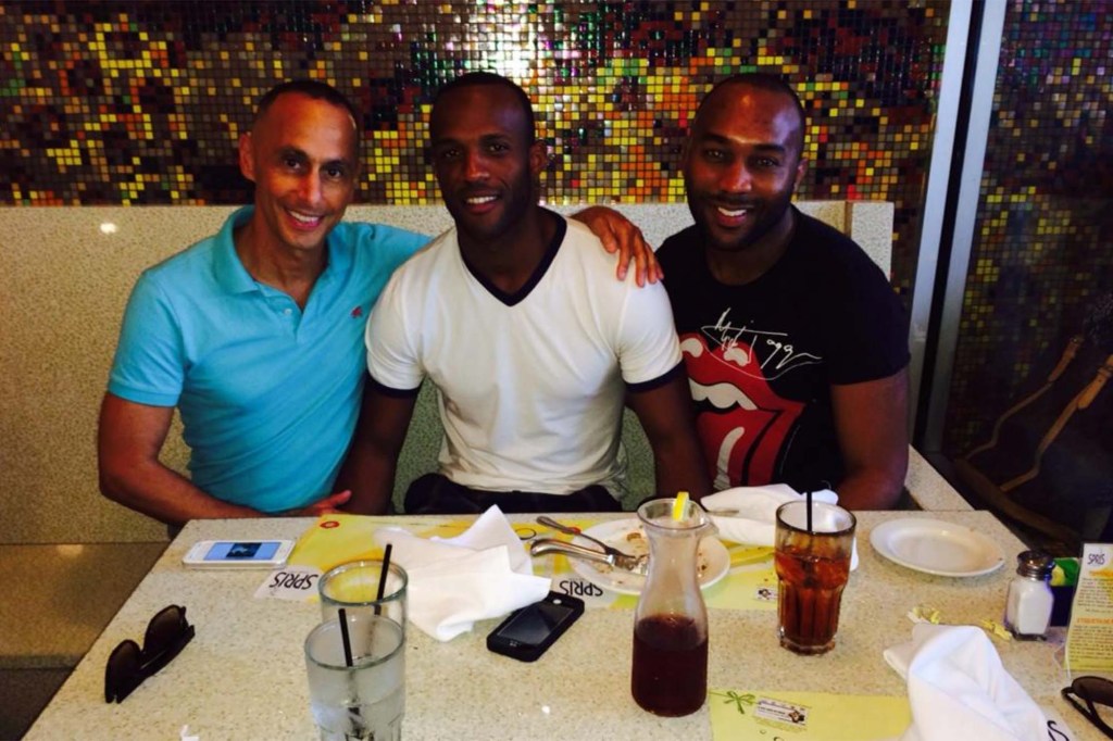 Maloney, Leath, unidentified person at table