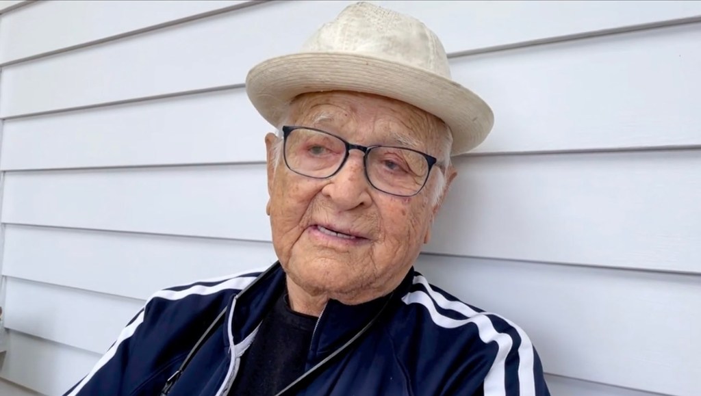 Norman Lear rang in his 100th birthday by covering Dean Martin's "That's Amore" and offering advice to his fans.