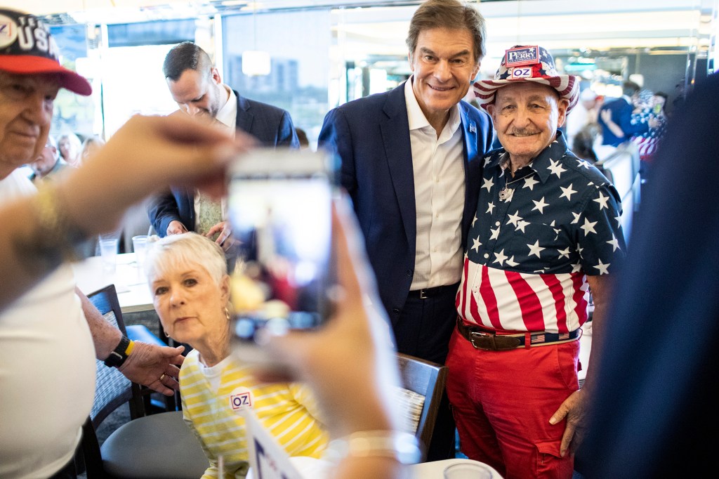 Dr. Mehmet Oz drops by The Capitol Diner in Swatara Township, Pa. Fetterman has routinely accused the celebrity physician of being an elitist.