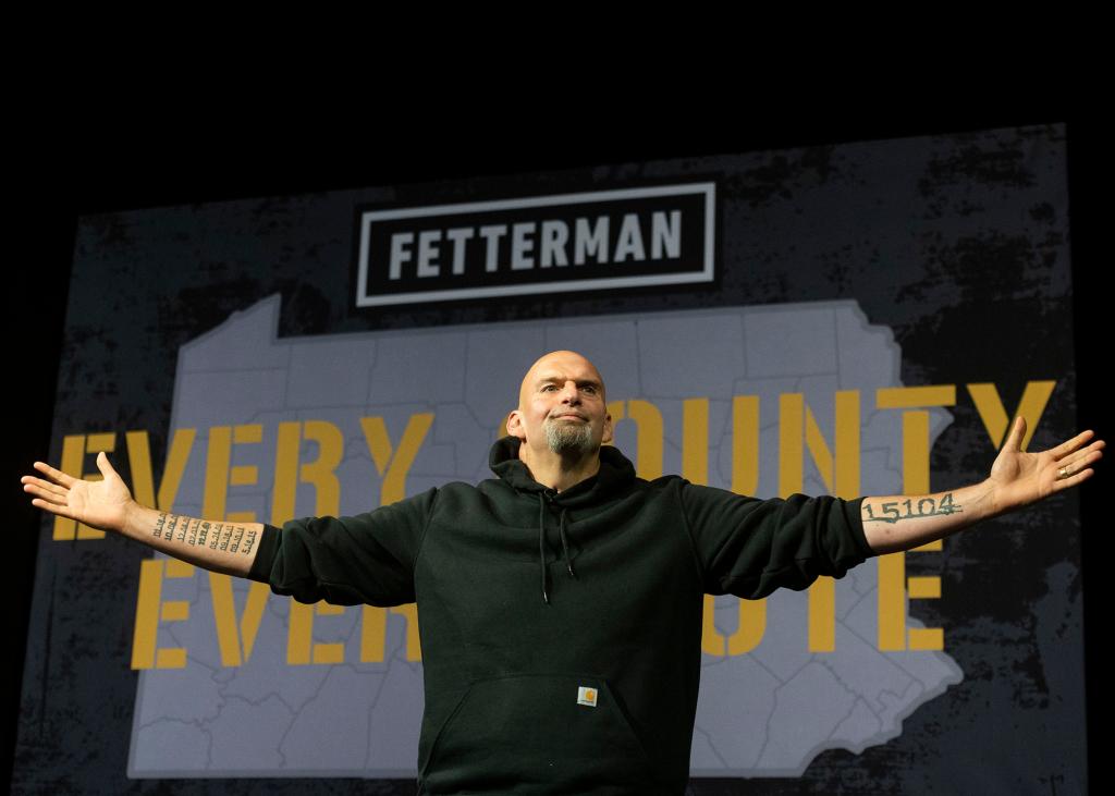 John Fetterman is welcomed back during a rally in Erie, Pa., his first major public appearance since suffering a stroke in May.