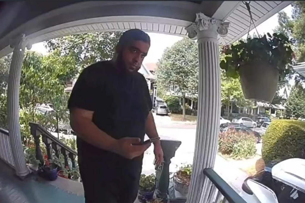 Khalid Mehdiyev outside of Alinejad's Brooklyn home with a loaded  AK-47.