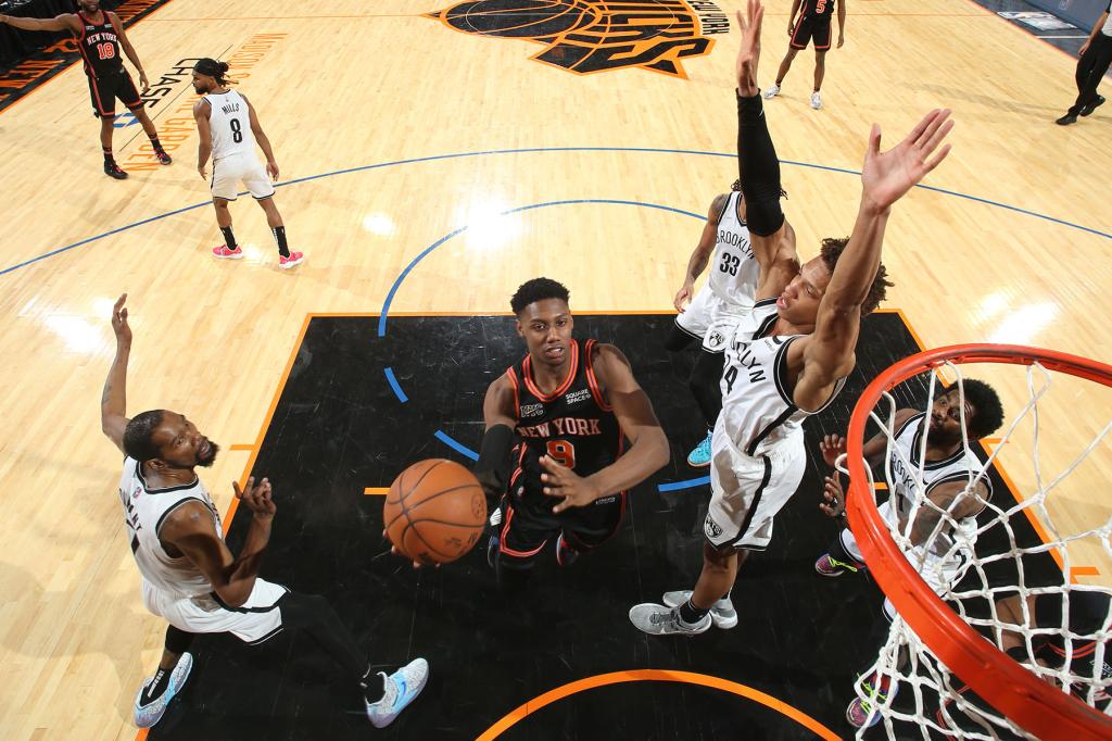 RJ Barrett #9 of the New York Knicks drives to the basket during the game against the Brooklyn Nets on April 6, 2022 at Madison Square Garden in New York City, New York. 