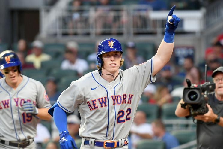 Brett Baty #22 of the New York Mets celebrates after hitting his first home run during his first MLB at bat against the Atlanta Braves in the second inning at Truist Park on August 17, 2022 in Atlanta, Georgia.