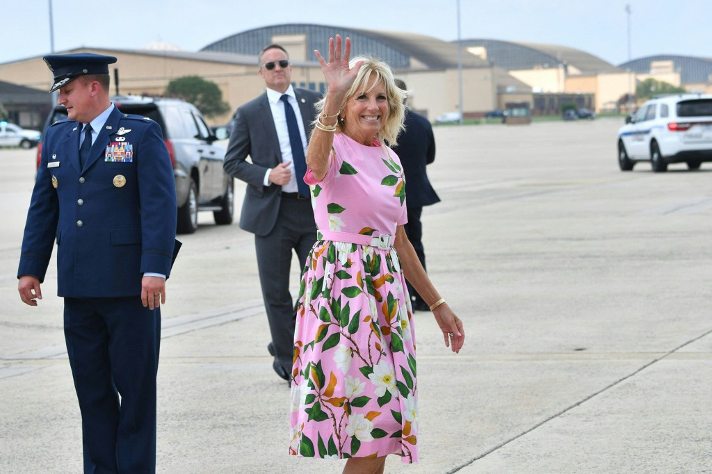 First Lady Jill Biden waving before boarding Air Force One.