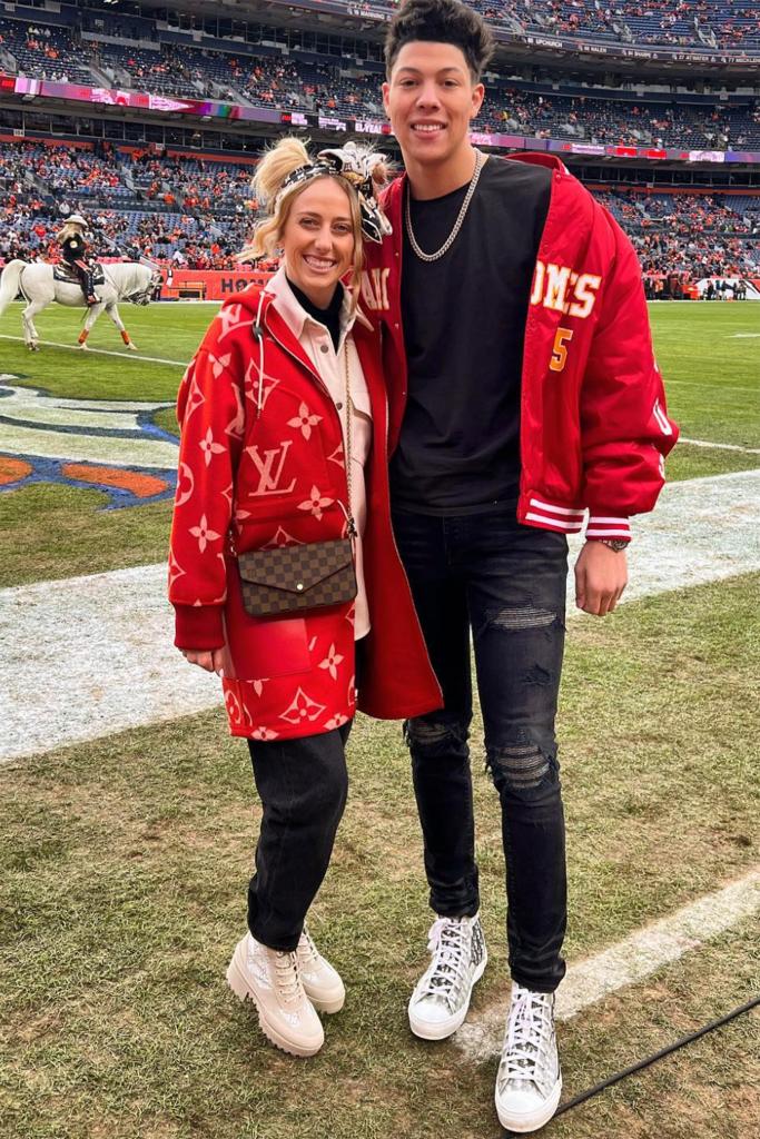 Brittany Matthews and Jackson Mahomes attend a Chiefs game during the 2021 season.