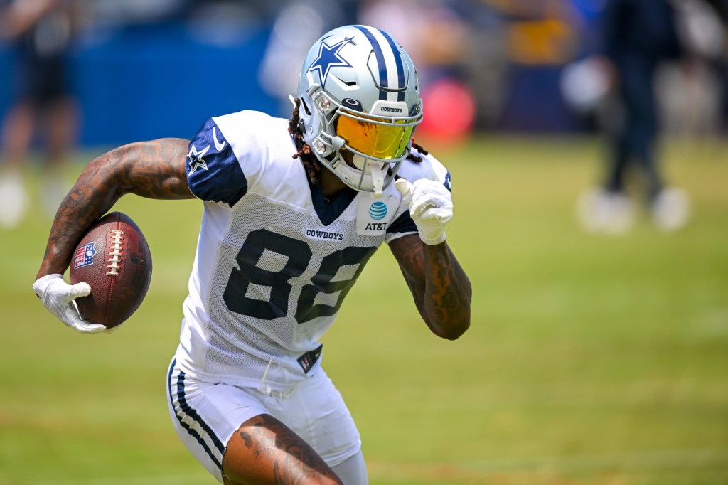 Cowboys receiver CeeDee Lamb running routes during practice.