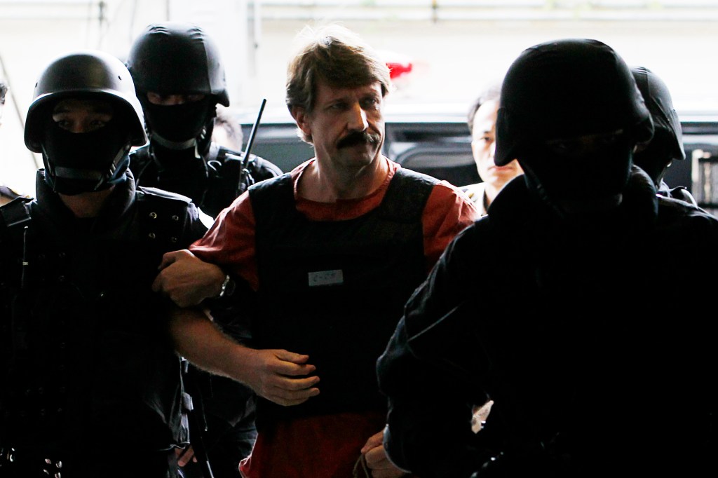 Russian arms dealer Viktor Bout arrived to Thai court guarded by authorities in 2010.