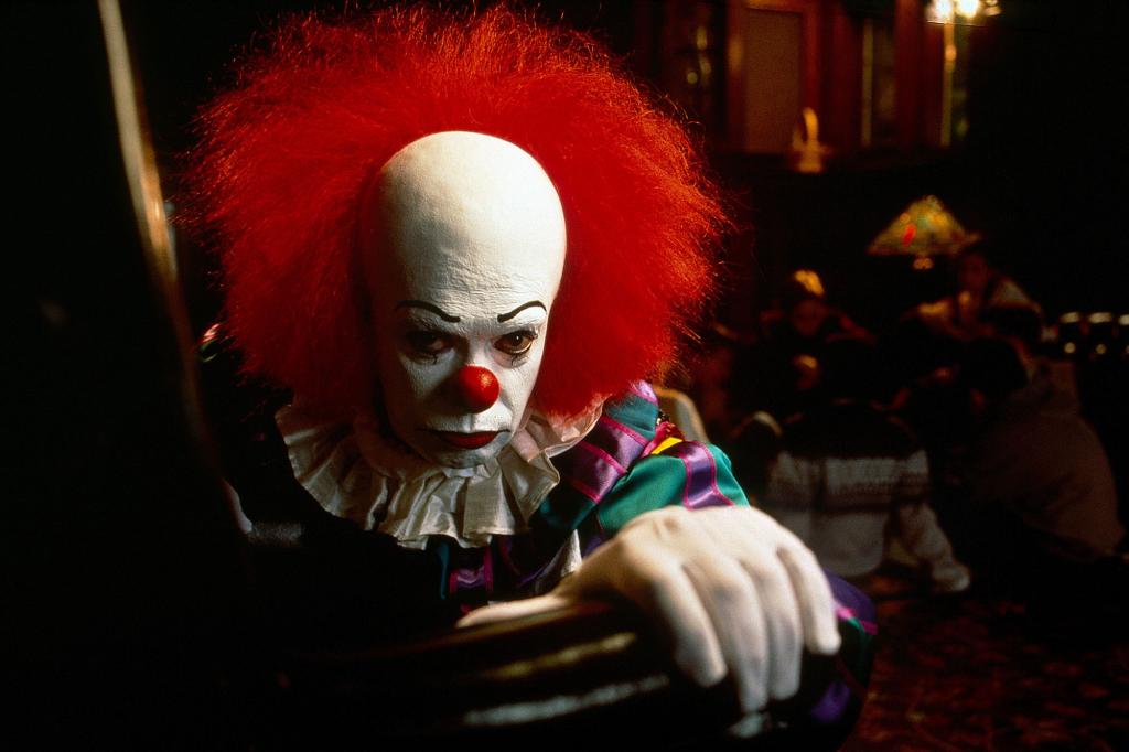 Tim Curry as Pennywise the Clown.