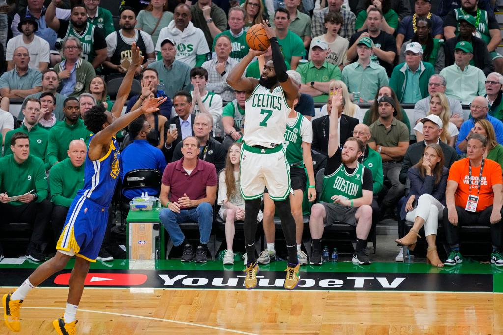 Jaylen Brown #7 of the Boston Celtics shoots a three point basket against the Golden State Warriors during Game Six of the 2022 NBA Finals on June 16, 2022 at TD Garden in Boston, Massachusetts.