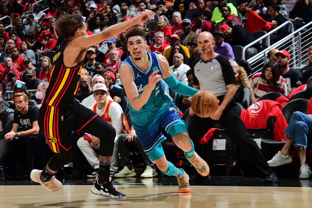 LaMelo Ball #2 of the Charlotte Hornets drives to the basket during the game against the Atlanta Hawks during the 2022 Play-In Tournament on April 13, 2022 at State Farm Arena in Atlanta, Georgia.