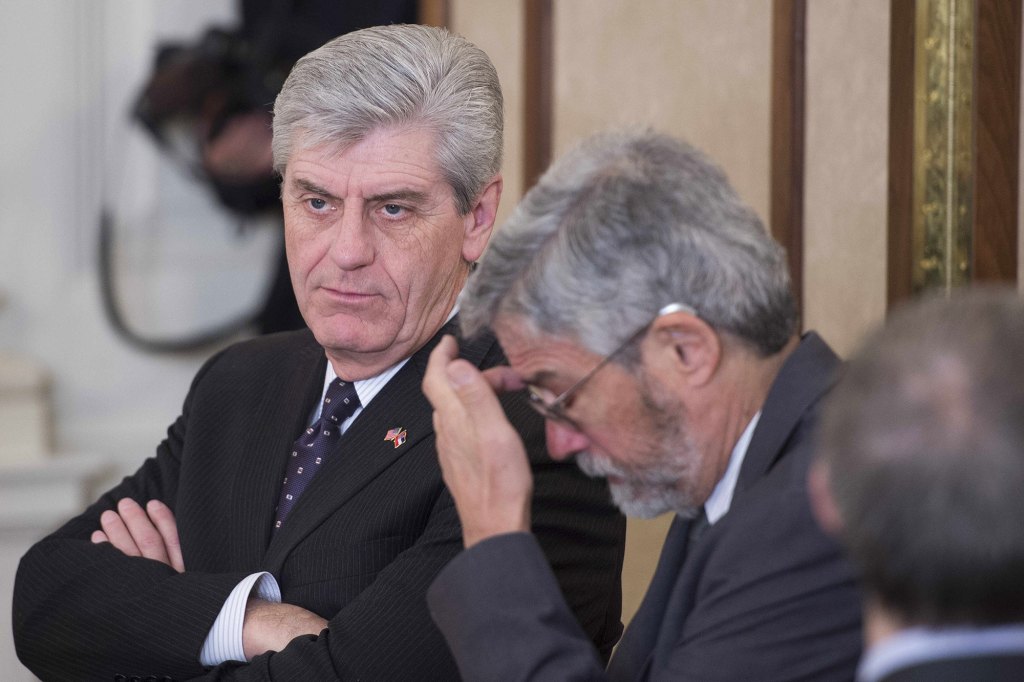 Mississippi Governor Phil Bryant (L) looks on during a meeting of the National Governors Association at the White House in Washington, DC, February 23, 2015. AFP PHOTO/JIM WATSON (Photo credit should read JIM WATSON/AFP via Getty Images)
