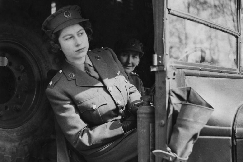 Then Elizabeth II drives an ambulance during her wartime service on April 10, 1945.