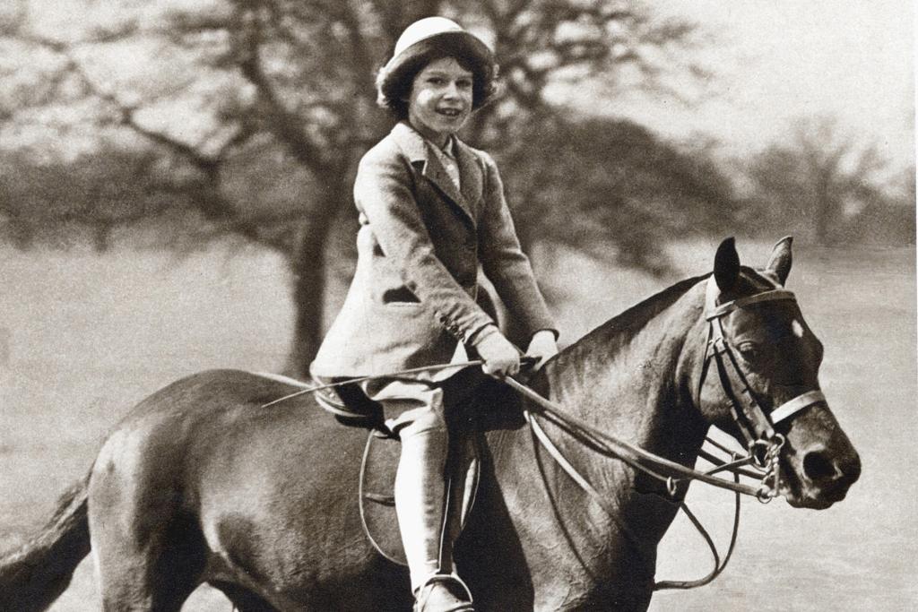 Then Princess Elizabeth rides her pony in Windsor Great Park in 1934.