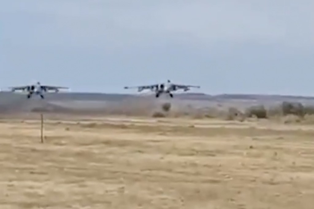 Video tweeted by Ukraine's Ministry of Defense shows what appear to be two Russian fighter jets taking off from Crimea. 