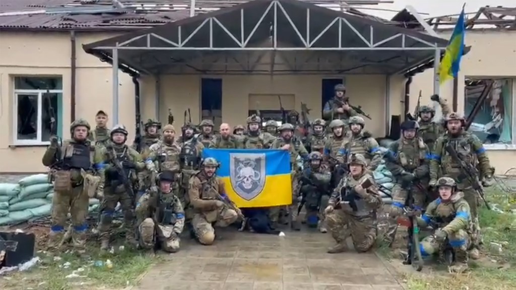 Ukrainian soldiers gather on Ukraine World Sunday. 