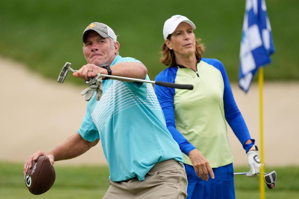 Brett Favre throws a football on the 14th green during the Celebrity Foursome at the American Family Insurance Championship golf event on June 11, 2022.