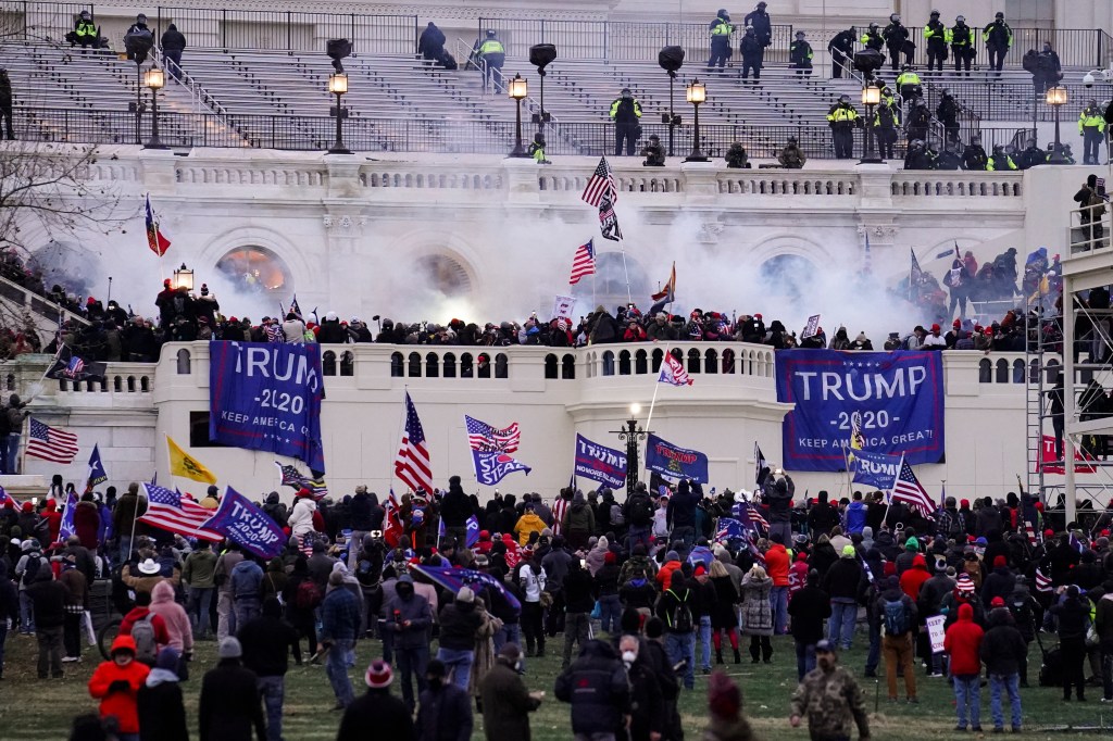 Rioters in support of former President Donald Trump storm the Capitol on January 6, 2021. 