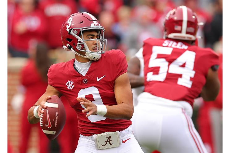 Alabama quarterback Bryce Young rares back for a pass.