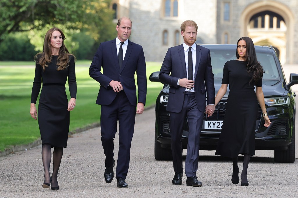 Catherine, Princess of Wales, Prince William, Prince of Wales, Prince Harry, Duke of Sussex, and Meghan, Duchess of Sussex on the long Walk at Windsor Castle arrive to view flowers and tributes to Queen Elizabeth on September 10, 2022 in Windsor, England.