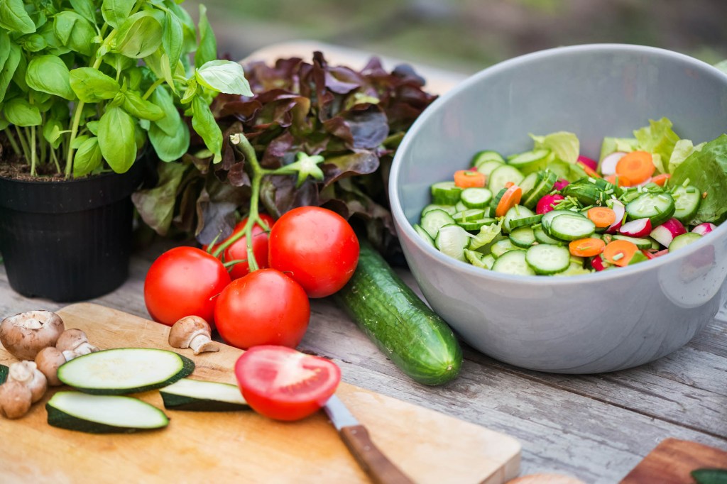 Fresh vegetable on vintage garden table