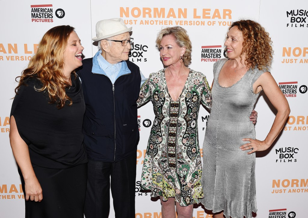 Heidi Ewing, Norman Lear, Lyn Lear, Rachel Grady pose on the red carpet. 