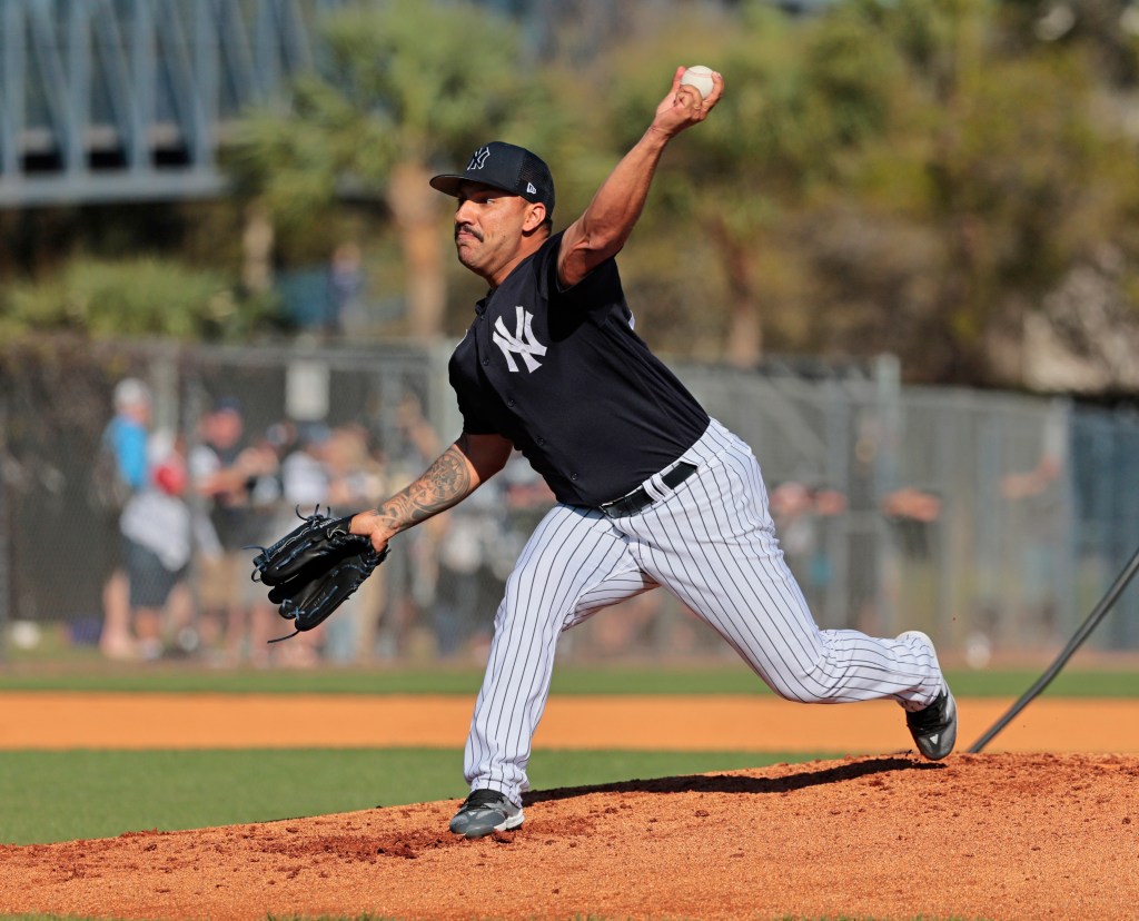 Nestor Cortes throwing live batting practice on a back field before a game against Detroit.