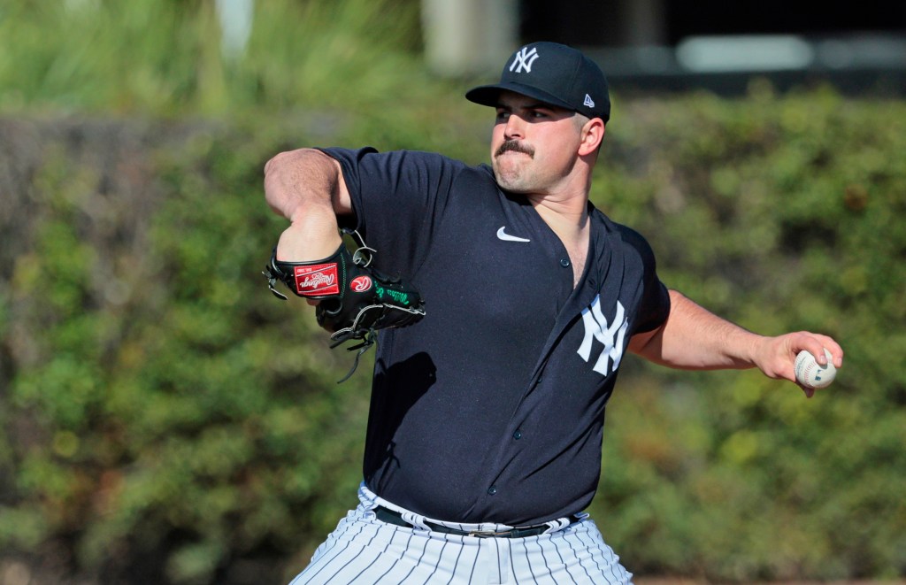 Carlos Rodon throwing live batting practice on a back field before a game against the Tigers.