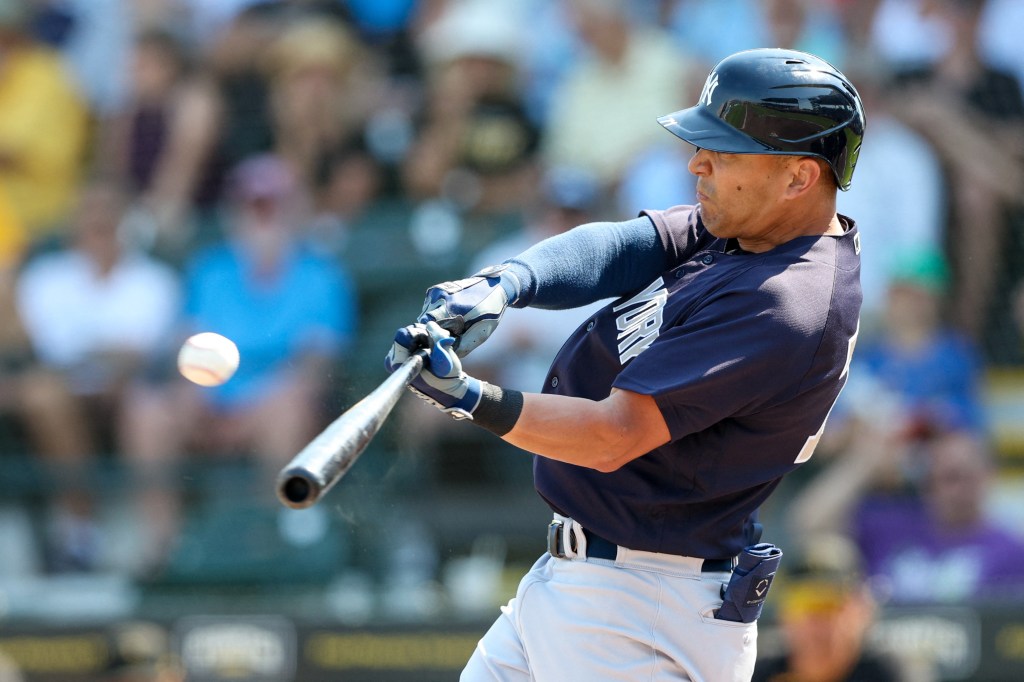 Yankees left fielder Rafael Ortega (71) hits a two-run home run