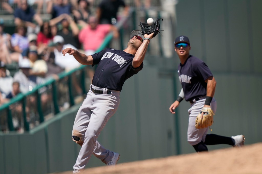 Yankees shortstop Isiah Kiner-Falefa grabs a fly out by Boston Red Sox Christian Arroyo