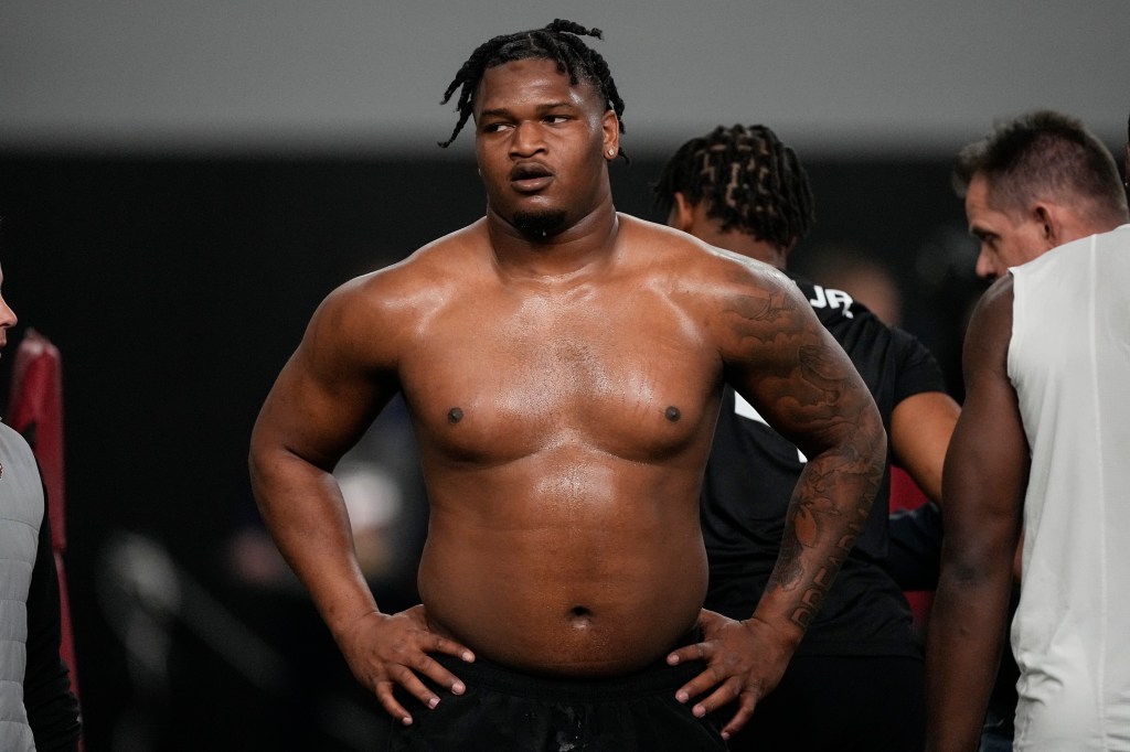 Former Georgia defensive lineman Jalen Carter stands after running football drills during Georgia's Pro Day, on March 15, 2023 in Athens, Ga.