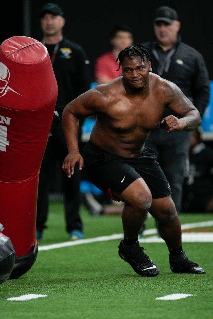 Former Georgia defensive lineman Jalen Carter runs football drills during Georgia's Pro Day on March 15, 2023, in Athens, Ga.