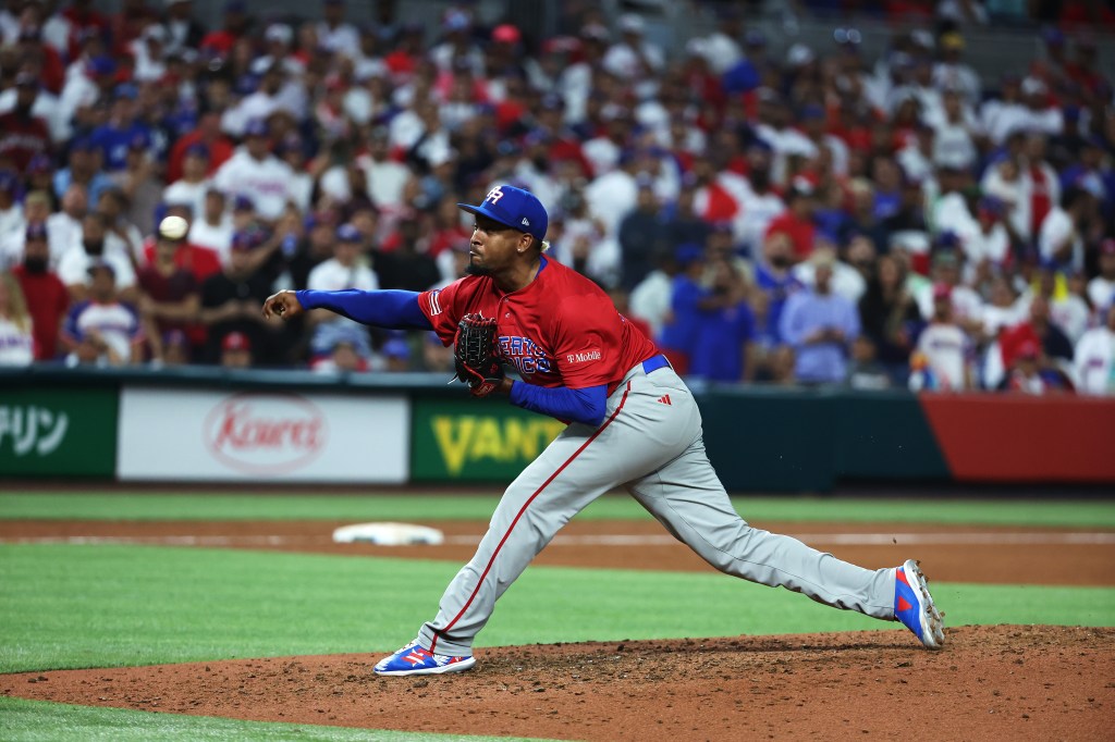 Alexis Diaz of Team Puerto Rico pitches against Team Dominican Republic during their World Baseball Classic Pool D game at loanDepot Park.