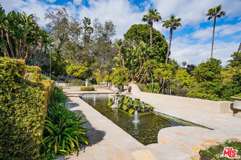 Fountains surround the home.