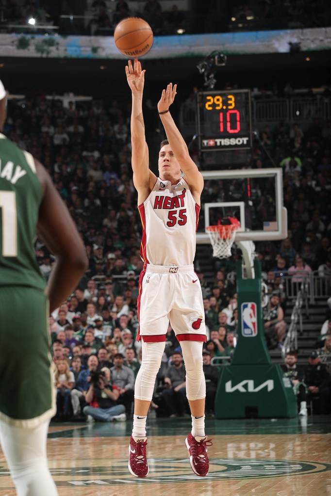 Duncan Robinson shoots a three point basket during Round One Game Five of the 2023 NBA Playoffs.