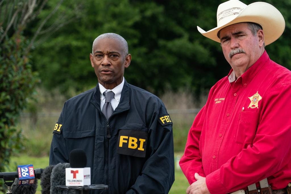 Special Agent in Charge of the FBI Houston James Smith and San Jacinto County Sheriff Greg Capers.