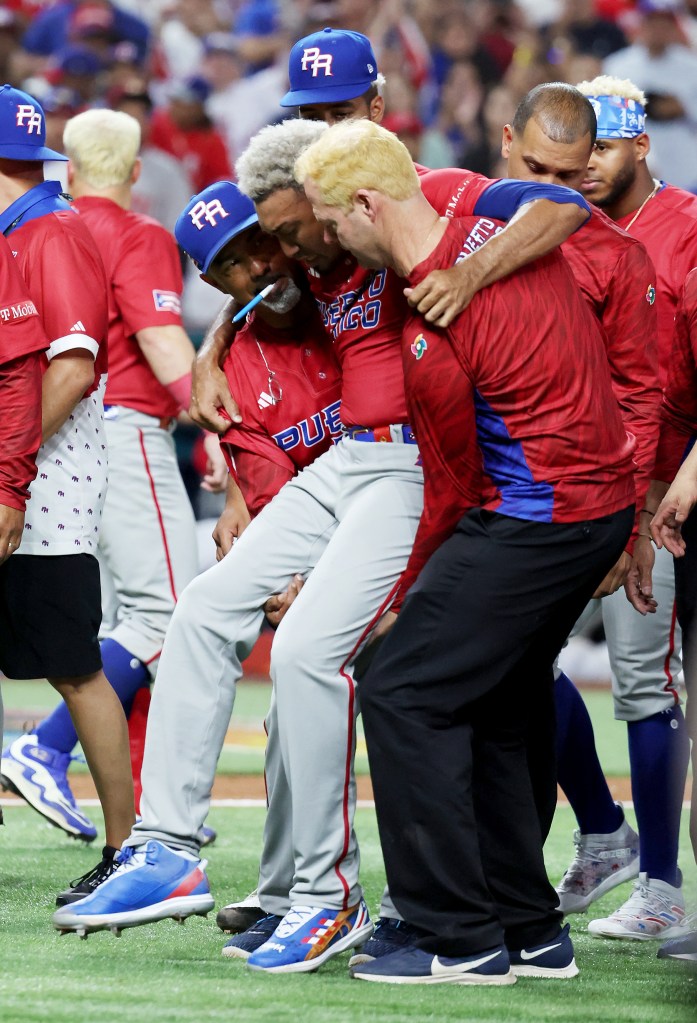 Edwin Diaz being carried off the field after suffering a knee injury during the World Baseball Classic on March 15, 2023.