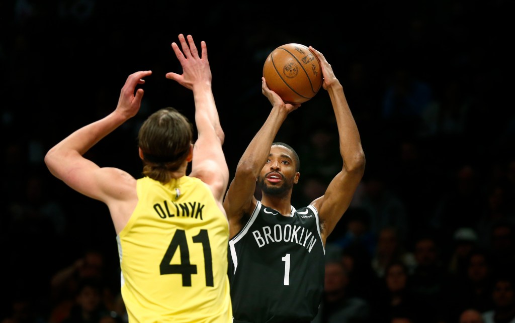 Mikal Bridges looks to shoot over Utah Jazz forward Kelly Olynyk.