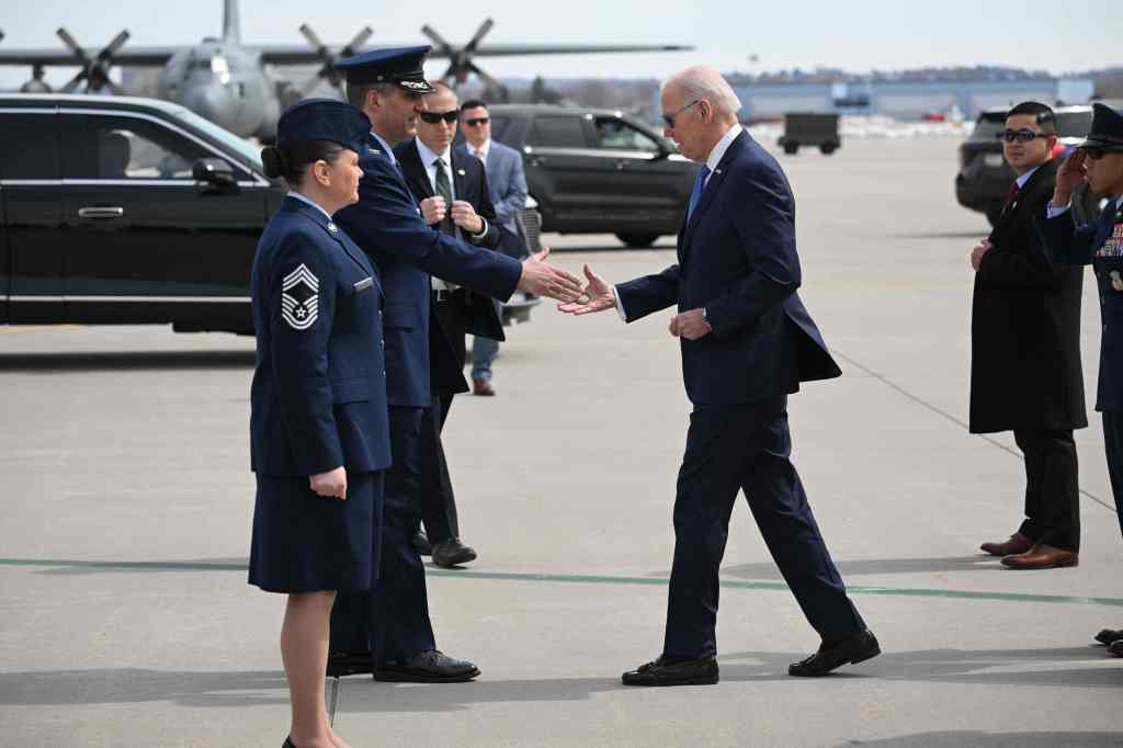 President Biden greets military members at Minneapolis-Saint Paul International Airport Monday, April 3, 2023. 