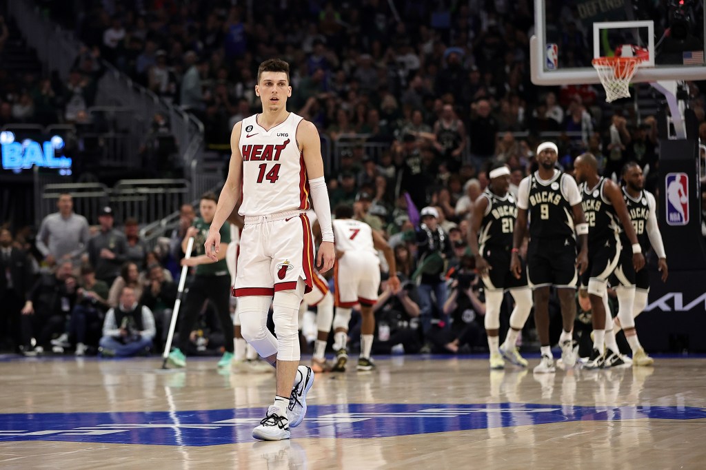 Tyler Herro #14 of the Miami Heat walks backcourt during the first half of Game One of the Eastern Conference First Round Playoffs against the Milwaukee Bucks at Fiserv Forum on April 16, 2023 in Milwaukee, Wisconsin.